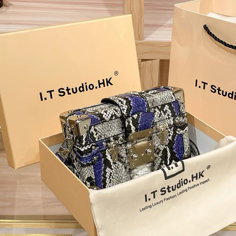 Mini borsa rigida con motivo a serpente