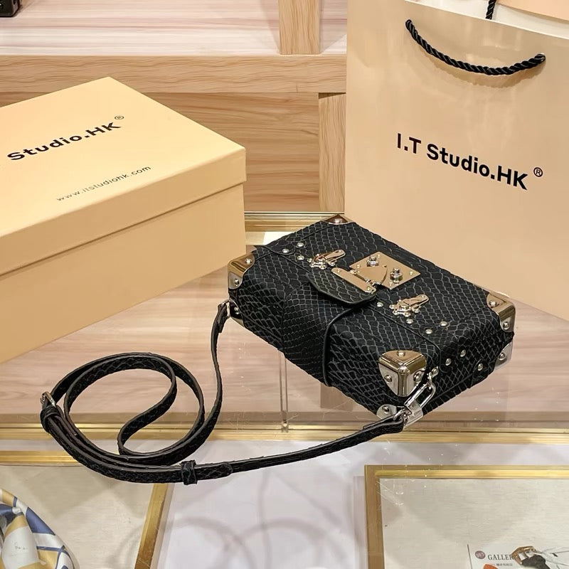 Mini borsa rigida con motivo a serpente