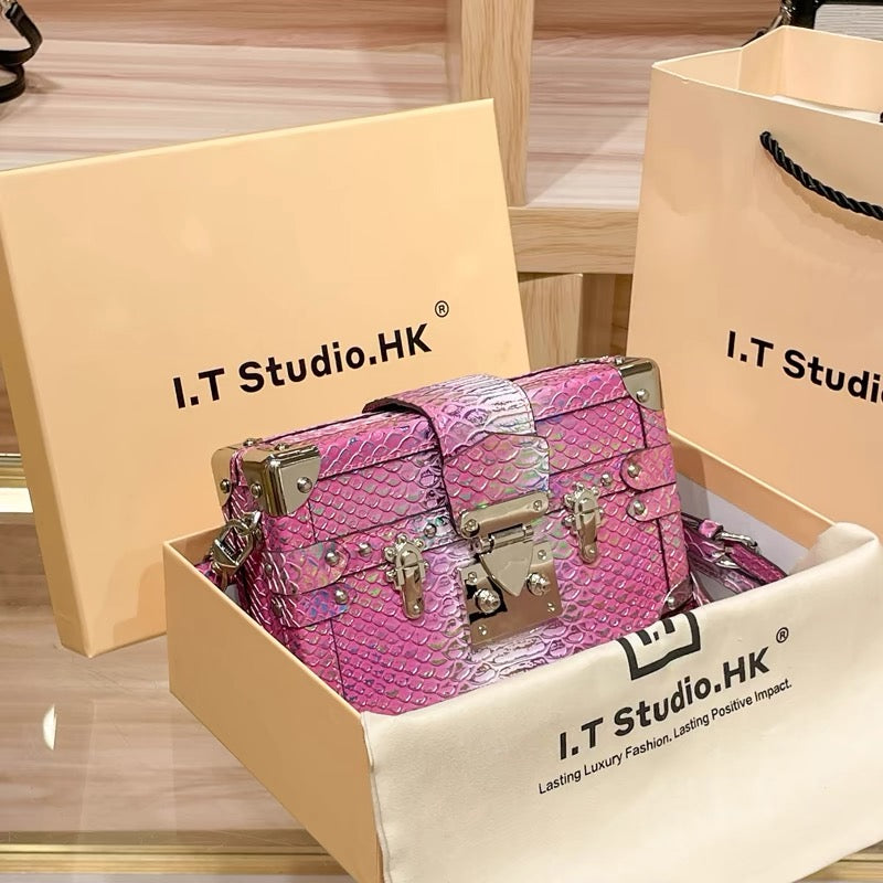 Mini borsa rigida con motivo a serpente